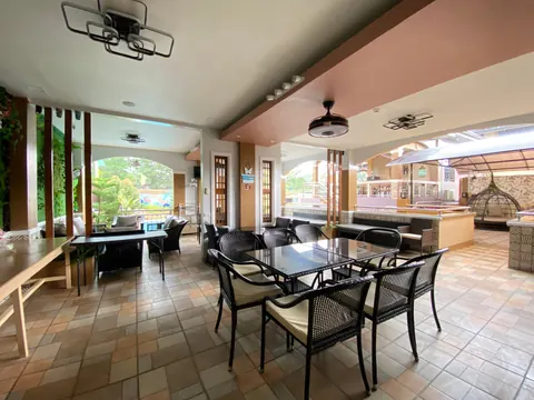 The covered common area with dining tables